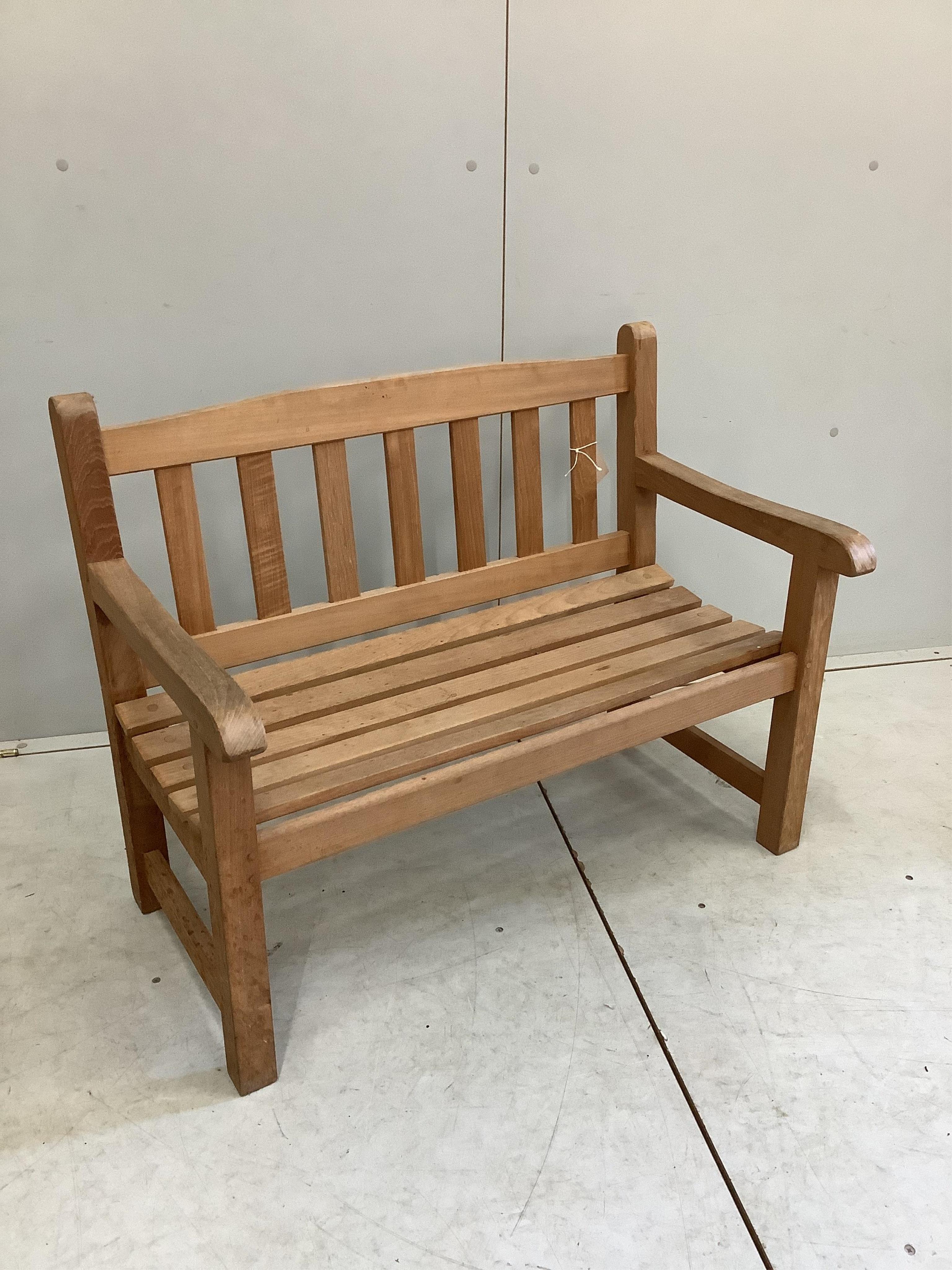 A child's teak garden bench, width 86cm, depth 47cm, height 68cm. Condition - good